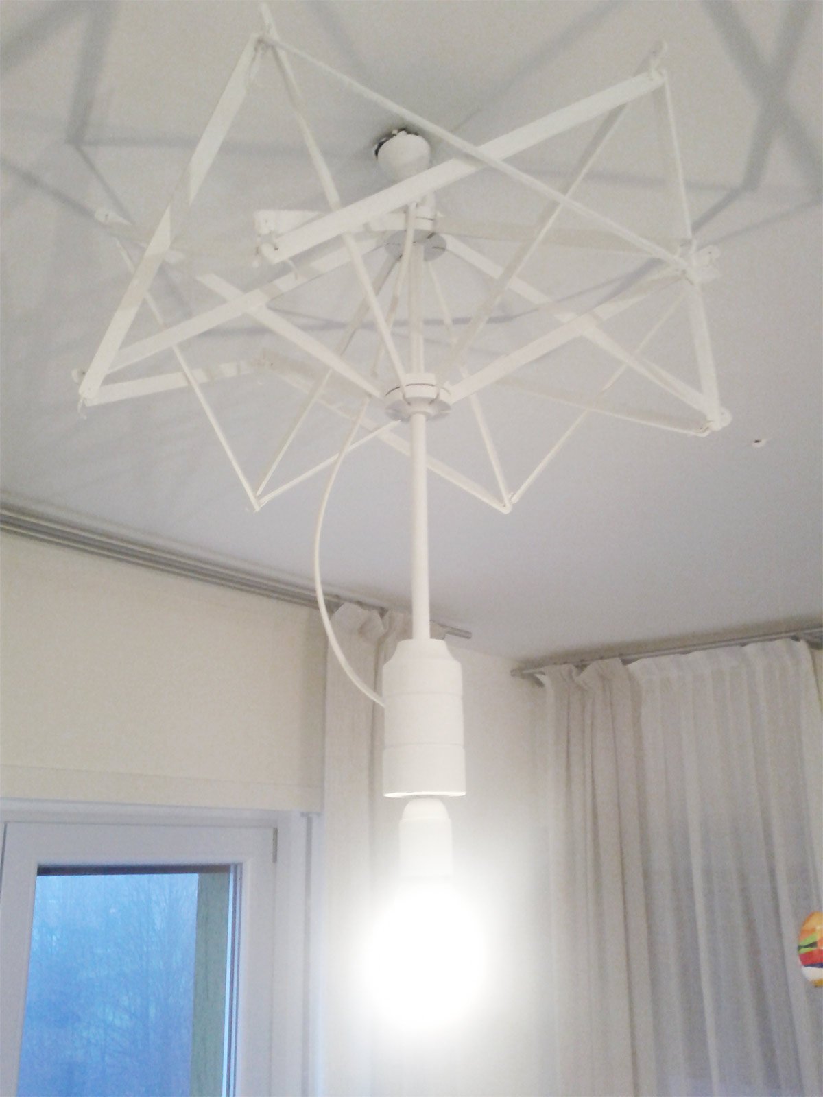 Lampadario fai da te con un vecchio arcolaio cose di casa