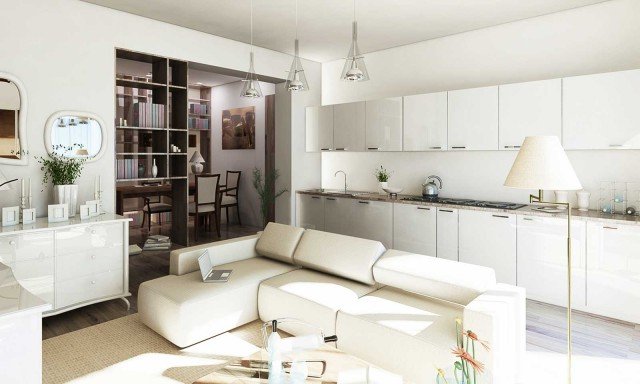 Cucina e salotto La cucina è super attrezzata lungo la parete libera di 450 cm. Bianca e dal design lineare, dialoga benissimo con lo stile e i colori dell’angolo conversazione, delimitato dal sofà di ampie proporzioni: un modello con sedute modulari la cui configurazione può variare in base alle esigenze. L’arredamento è improntato alla massima eleganza e contemporaneità ed enfatizza la luce e la leggerezza di tutto l’ambiente. Benché suddiviso, ai fini della normativa il soggiorno è un locale unico. Privo di chiusure intermedie, prende luce e aria dalle due aperture del balcone. Cucina e salotto La cucina è super attrezzata lungo la parete libera di 450 cm. Bianca e dal design lineare, dialoga benissimo con lo stile e i colori dell’angolo conversazione, delimitato dal sofà di ampie proporzioni: un modello con sedute modulari la cui configurazione può variare in base alle esigenze. L’arredamento è improntato alla massima eleganza e contemporaneità ed enfatizza la luce e la leggerezza di tutto l’ambiente. Benché suddiviso, ai fini della normativa il soggiorno è un locale unico. Privo di chiusure intermedie, prende luce e aria dalle due aperture del balcone.