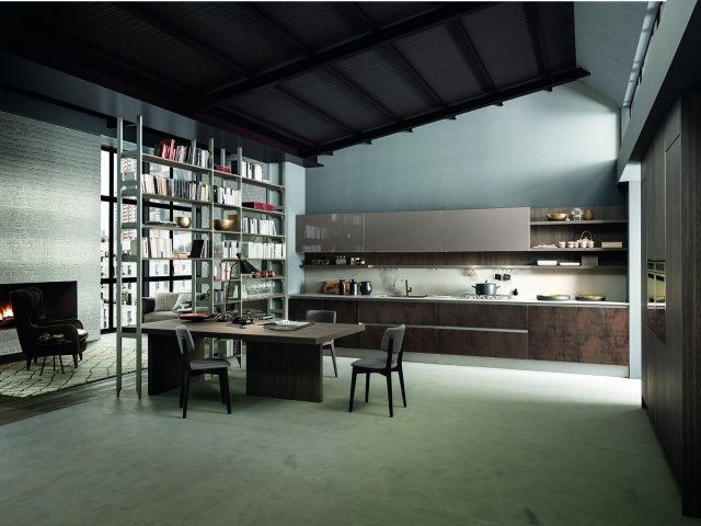 La struttura living di Kaleidos di Febal Casa, realizzata con gli innovativi pali Joint in metallo, è sapientemente abbinata alle gole della cucina mentre il pensile in olmo scuro dona profondità e armonia alla composizione. La struttura living di Kaleidos di Febal Casa, realizzata con gli innovativi pali Joint in metallo, è sapientemente abbinata alle gole della cucina mentre il pensile in olmo scuro dona profondità e armonia alla composizione.