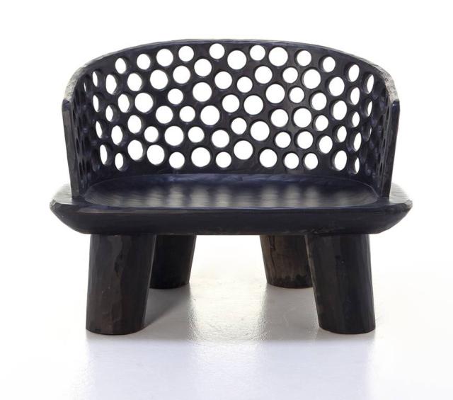 Carve 07 di Gervasoni, design Paola Navone, è la poltrona bassa in mogano intagliato a mano nella finitura colore ebano: ricorda una scultura tribale. La seduta è leggermente sagomata e lo schienale semicircolare è interamente forato in modo irregolare. Misura L 84 x P 69 x H 61 cm. www.gervasoni1882.it Carve 07 di Gervasoni, design Paola Navone, è la poltrona bassa in mogano intagliato a mano nella finitura colore ebano: ricorda una scultura tribale. La seduta è leggermente sagomata e lo schienale semicircolare è interamente forato in modo irregolare. Misura L 84 x P 69 x H 61 cm. www.gervasoni1882.it