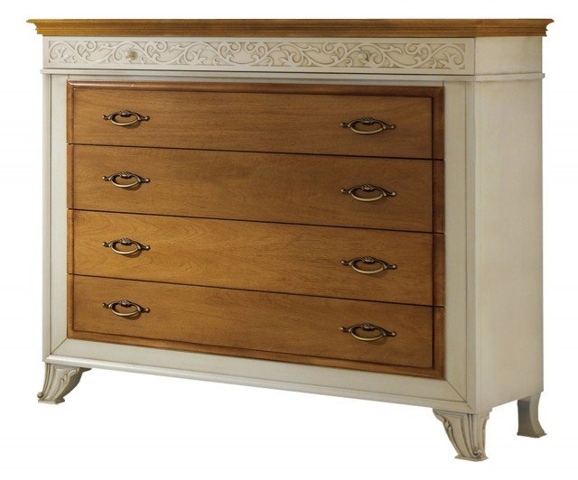 Valorizzato dalla solidità del legno massiccio, il comò Margot di Stilema prodotto con metodi artigianali ha una linea morbida grazie anche all'abbinamento di due diverse finiture: avorio vintage per la struttura, noce grano per i cassetti. Ha lavorazione con incastri a coda di rondine. Misura L 133 x P 54 x H 126. Prezzo 1.990 euro. www.stilema.it Valorizzato dalla solidità del legno massiccio, il comò Margot di Stilema prodotto con metodi artigianali ha una linea morbida grazie anche all'abbinamento di due diverse finiture: avorio vintage per la struttura, noce grano per i cassetti. Ha lavorazione con incastri a coda di rondine. Misura L 133 x P 54 x H 126. Prezzo 1.990 euro. www.stilema.it