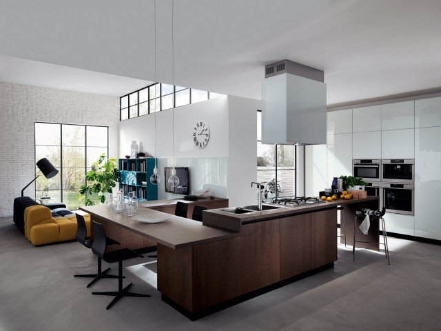 La composizione a isola per soggiorno e cucina ha le basi ad ante impiallacciate in rovere color tabacco con gole in alluminio e il piano in laminato colore porfido. L’armadiatura dispensa con colonne elettrodomestici è in laccato bianco lucido. Prezzo su preventivo. Liberamente di Scavolini La composizione a isola per soggiorno e cucina ha le basi ad ante impiallacciate in rovere color tabacco con gole in alluminio e il piano in laminato colore porfido. L’armadiatura dispensa con colonne elettrodomestici è in laccato bianco lucido. Prezzo su preventivo. Liberamente di Scavolini