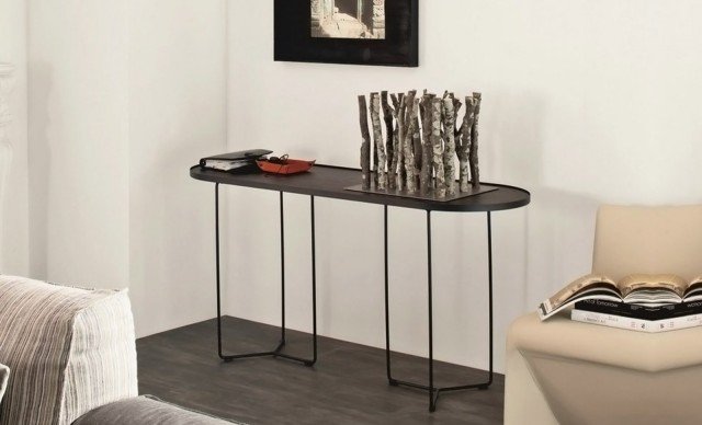 Billy Wood, di Cattelan Italia, è una console dal design leggero, arrotondato e moderno. Si adatta ad un ambiente living ricercato e di gusto, comodo ma non invadente. La base è in acciaio verniciato goffrato nero mentre il piano è in rovere bruciato. Misura L 150 x P 50 x H 75 cm. Prezzo 735 euro. www.cattelanitalia.com Billy Wood, di Cattelan Italia, è una console dal design leggero, arrotondato e moderno. Si adatta ad un ambiente living ricercato e di gusto, comodo ma non invadente. La base è in acciaio verniciato goffrato nero mentre il piano è in rovere bruciato. Misura L 150 x P 50 x H 75 cm. Prezzo 735 euro. www.cattelanitalia.com