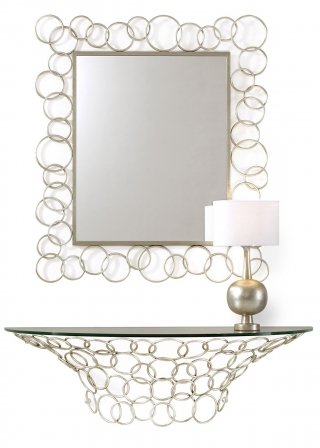 7. Sospesa È interamente realizzata in ferro pieno trafilato manualmente impreziosito da una raffinata finitura foglia argento champagne; il piano semiellittico è in vetro trasparente. È disponibile anche lo specchio coordinato per creare un arredo completo. Misura L 123 x P 40 x H 38 cm e costa 639 euro. Mondrian di Cantori. www.cantori.it 7. Sospesa È interamente realizzata in ferro pieno trafilato manualmente impreziosito da una raffinata finitura foglia argento champagne; il piano semiellittico è in vetro trasparente. È disponibile anche lo specchio coordinato per creare un arredo completo. Misura L 123 x P 40 x H 38 cm e costa 639 euro. Mondrian di Cantori. www.cantori.it