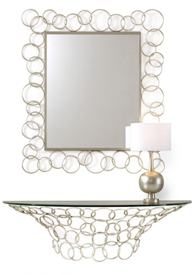 7. Sospesa È interamente realizzata in ferro pieno trafilato manualmente impreziosito da una raffinata finitura foglia argento champagne; il piano semiellittico è in vetro trasparente. È disponibile anche lo specchio coordinato per creare un arredo completo. Misura L 123 x P 40 x H 38 cm e costa 639 euro. Mondrian di Cantori. www.cantori.it 7. Sospesa È interamente realizzata in ferro pieno trafilato manualmente impreziosito da una raffinata finitura foglia argento champagne; il piano semiellittico è in vetro trasparente. È disponibile anche lo specchio coordinato per creare un arredo completo. Misura L 123 x P 40 x H 38 cm e costa 639 euro. Mondrian di Cantori. www.cantori.it