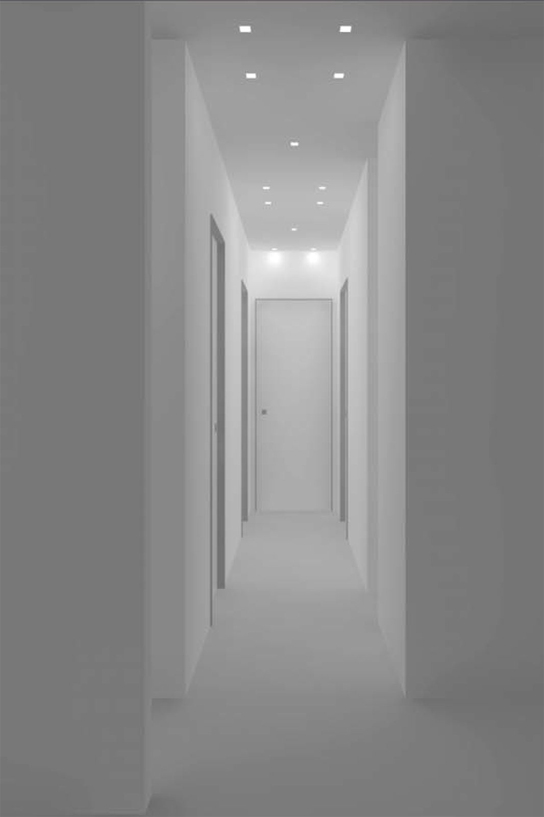 Il corridoio con i faretti a soffitto Il corridoio con i faretti a soffitto