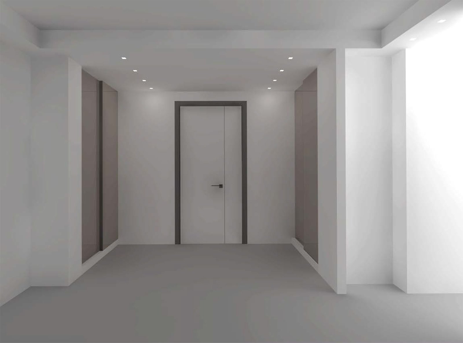 L'ingresso con i faretti a incasso nel controsoffitto su due file parallele vicine agli armadi a muro L'ingresso con i faretti a incasso nel controsoffitto su due file parallele vicine agli armadi a muro