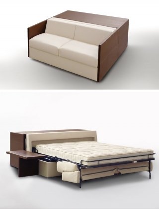 Divano-letto. BK 119 B di BKGroup di giorno è un comodo divano, completamente sfoderabile, dotato di due contenitori portaoggetti e di un tavolo posizionato dietro lo schienale; di notte si trasforma in un letto con due comodini laterali. La struttura è interamente realizzata in legno naturale. Misura L 171 x P 93 x H 70 cm. Prezzo 4.437,14 euro (escluso il tavolo). www.bkitalia.com Divano-letto. BK 119 B di BKGroup di giorno è un comodo divano, completamente sfoderabile, dotato di due contenitori portaoggetti e di un tavolo posizionato dietro lo schienale; di notte si trasforma in un letto con due comodini laterali. La struttura è interamente realizzata in legno naturale. Misura L 171 x P 93 x H 70 cm. Prezzo 4.437,14 euro (escluso il tavolo). www.bkitalia.com