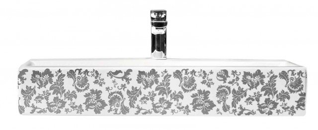 Memento di Villeroy& Boch è un grande lavabo candido con il fronte decorato da un motivo floreale stilizzato effetto pizzo. Misura L 120 x P 47 cm. Prezzo 1.804,38 euro. www.villeroy-boch.com Memento di Villeroy& Boch è un grande lavabo candido con il fronte decorato da un motivo floreale stilizzato effetto pizzo. Misura L 120 x P 47 cm. Prezzo 1.804,38 euro. www.villeroy-boch.com