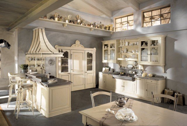 Dhialma di Marchi Cucine è realizzata in legno massello laccato nelle tonalità tenui del beige e del grigio; è impreziosita da intagli e dall’insolita presenza di piani in peltro che ne accentuano il sapore rétro. La penisola è dotata di bancone snack. Un elemento misura L 206 x P 82 cm, prezzo della versione base 1.500 euro (con top in peltro). www.marchicucine.it Dhialma di Marchi Cucine è realizzata in legno massello laccato nelle tonalità tenui del beige e del grigio; è impreziosita da intagli e dall’insolita presenza di piani in peltro che ne accentuano il sapore rétro. La penisola è dotata di bancone snack. Un elemento misura L 206 x P 82 cm, prezzo della versione base 1.500 euro (con top in peltro). www.marchicucine.it