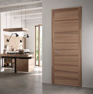 La porta della collezione Exit di FerreroLegno ha finitura Noce Natural Touch. Questa finitura ha un tranciato con un colore a ridotto contrasto: smorzando i contrasti tipici di questa essenza, si abbina facilmente a qualsiasi tipo di arredo. Con telaio Evoluto da 10 cm, misura L 80 x H 240 cm. Prezzo, Iva esclusa, 840 euro. www.ferrerolegnoporte.it La porta della collezione Exit di FerreroLegno ha finitura Noce Natural Touch. Questa finitura ha un tranciato con un colore a ridotto contrasto: smorzando i contrasti tipici di questa essenza, si abbina facilmente a qualsiasi tipo di arredo. Con telaio Evoluto da 10 cm, misura L 80 x H 240 cm. Prezzo, Iva esclusa, 840 euro. www.ferrerolegnoporte.it