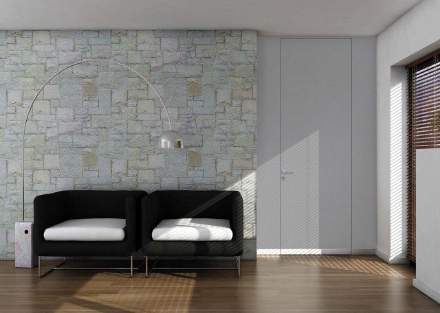 La porta a filo muro Walldoor di Bertolotto Porte è reversibile, cioè permette in fase d’installazione di stabilire il senso di apertura, invertendo il posizionamento del telaio e la spinta di apertura (destra o sinistra). Ha il telaio in alluminio estruso e ossidato e il pannello in tamburato che può essere personalizzato per colore e materia come la superficie della parete. La porta è dotata di serratura magnetica con chiave. Misura 80x210 cm. Prezzo da rivenditore. www.bertolotto.com La porta a filo muro Walldoor di Bertolotto Porte è reversibile, cioè permette in fase d’installazione di stabilire il senso di apertura, invertendo il posizionamento del telaio e la spinta di apertura (destra o sinistra). Ha il telaio in alluminio estruso e ossidato e il pannello in tamburato che può essere personalizzato per colore e materia come la superficie della parete. La porta è dotata di serratura magnetica con chiave. Misura 80x210 cm. Prezzo da rivenditore. www.bertolotto.com