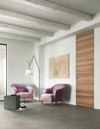 Si chiama Exit Zero la porta rasomuro di FerreroLegno che telaio A_Filo, completamente integrato nel muro realizzato in alluminio. La porta che si caratterizza per le venature orizzontali, è disponibile nelle finiture: Noce natural touch e Rovere natural touch, nelle 16 tonalità della cartella colori FerreroLegno in laccatura lucida poliestere al 100% e con anta grezza personalizzabile con finiture tipo tempere, stucchi e carta da parati. La serratura magnetica è di serie e le cerniere invisibili sono registrabili su tre assi per assicurare una perfetta complanarità alla parete. Misura 80x270 cm. Con finitura in Noce natural touch, prezzo 1.018,7 euro. www.ferrerolegno.com Si chiama Exit Zero la porta rasomuro di FerreroLegno che telaio A_Filo, completamente integrato nel muro realizzato in alluminio. La porta che si caratterizza per le venature orizzontali, è disponibile nelle finiture: Noce natural touch e Rovere natural touch, nelle 16 tonalità della cartella colori FerreroLegno in laccatura lucida poliestere al 100% e con anta grezza personalizzabile con finiture tipo tempere, stucchi e carta da parati. La serratura magnetica è di serie e le cerniere invisibili sono registrabili su tre assi per assicurare una perfetta complanarità alla parete. Misura 80x270 cm. Con finitura in Noce natural touch, prezzo 1.018,7 euro. www.ferrerolegno.com