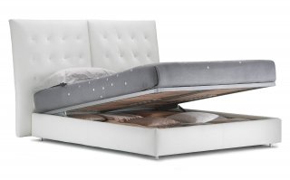 Letto Angle di Flou con contenitore e testata imbottita sfoderabile Letto Angle di Flou con contenitore e testata imbottita sfoderabile