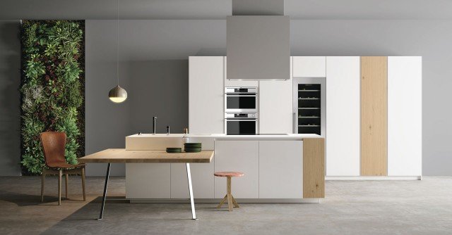 Nel modello Materia di Doimocucine l’isola centrale in laccato super matt Ral 9003 con top in Corian termina con un cambio di materiale che ne spezza la linearità. L’ampio tavolo interseca l’isola subito sotto il blocco in Corian creando una zona pranzo distinta ma perfettamente integrata. Per una base da L 60 e profondità ridotta: prezzo 252 euro. www.doimocucine.it Nel modello Materia di Doimocucine l’isola centrale in laccato super matt Ral 9003 con top in Corian termina con un cambio di materiale che ne spezza la linearità. L’ampio tavolo interseca l’isola subito sotto il blocco in Corian creando una zona pranzo distinta ma perfettamente integrata. Per una base da L 60 e profondità ridotta: prezzo 252 euro. www.doimocucine.it