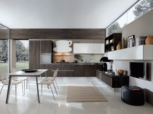 Ante in quercia moka per Erika di Aran Cucine che dà vita ad una zona cucina-living fresca e accogliente. I pensili a sviluppo orizzontale hanno la finitura bianco lucido. Un modulo base da 60 cm, prezzo 154 euro. www.arancucine.it Ante in quercia moka per Erika di Aran Cucine che dà vita ad una zona cucina-living fresca e accogliente. I pensili a sviluppo orizzontale hanno la finitura bianco lucido. Un modulo base da 60 cm, prezzo 154 euro. www.arancucine.it