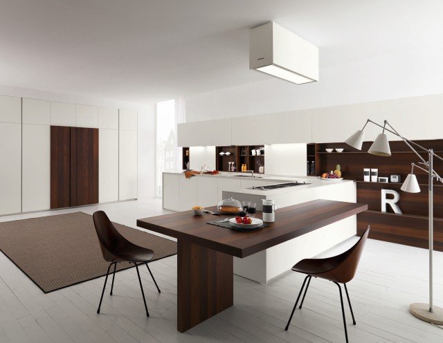 Axis 012 di Zampieri Cucine ha gli elementi realizzati in laccato opaco bianco e il piano Slim in Unicolor extra bianco. Il grande tavolo che si innesta, come un prolungamento, nella penisola è in pregiata Acacia Termica come le ante della colonna dispensa e la boiserie che “scaldano” tutta la composizione. Prezzo su richiesta. www.zampiericucine.it Axis 012 di Zampieri Cucine ha gli elementi realizzati in laccato opaco bianco e il piano Slim in Unicolor extra bianco. Il grande tavolo che si innesta, come un prolungamento, nella penisola è in pregiata Acacia Termica come le ante della colonna dispensa e la boiserie che “scaldano” tutta la composizione. Prezzo su richiesta. www.zampiericucine.it