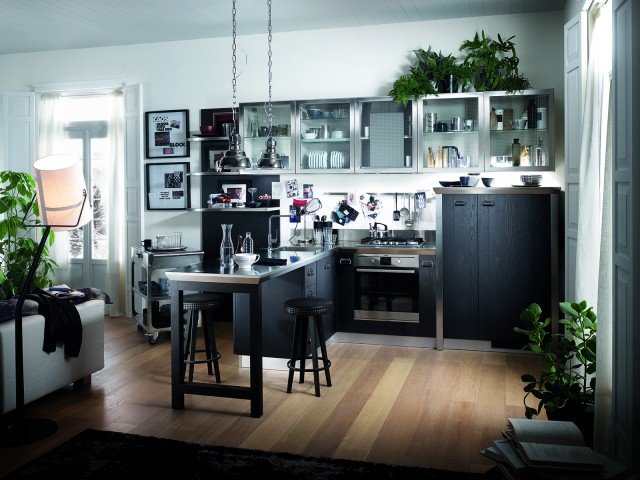 cucina nera ad angolo aperta su living Diesel Social Kitchen di Scavolini cucina nera ad angolo aperta su living Diesel Social Kitchen di Scavolini
