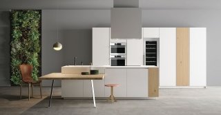 cucina in laccato supermatt bianco e top in corian Materia di Doimocucine cucina in laccato supermatt bianco e top in corian Materia di Doimocucine