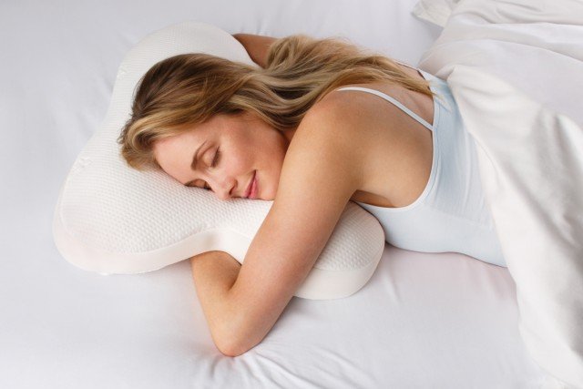 TEMPUR Ombracio Ergonomic Pillow with model TEMPUR Ombracio Ergonomic Pillow with model