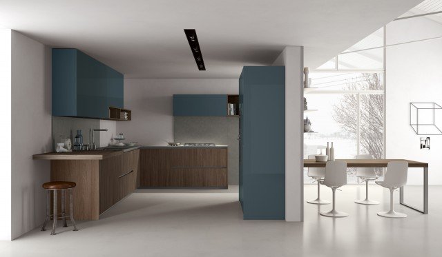 Grigio blu e legno per Style di Doimo Cucine, il modello che ha le basi e la boiserie in laminato Olmo Nocciola, i grandi pensili con vani a giorno e le colonne sono in laccato lucido Grigio Blu. Il sistema di apertura a gola delle ante è nella finitura alluminio opaco. Una base per piano cottura in laminato misura L 90 x H 84,3 cm. Prezzo 458 euro. www.doimocucine.it Grigio blu e legno per Style di Doimo Cucine, il modello che ha le basi e la boiserie in laminato Olmo Nocciola, i grandi pensili con vani a giorno e le colonne sono in laccato lucido Grigio Blu. Il sistema di apertura a gola delle ante è nella finitura alluminio opaco. Una base per piano cottura in laminato misura L 90 x H 84,3 cm. Prezzo 458 euro. www.doimocucine.it