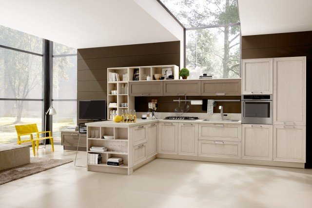 I numerosi elementi a giorno di Maxim di Stosa Cucine permettono di esporre stoviglie e oggetti dando vita ad un’atmosfera accogliente e conviviale che integra la cucina con il living. Inoltre la penisola è dotata di un mini bancone snack con sgabelli. Le ante sono nella finitura Frassino tinto duna e seta, sono dotate di maniglie nella versione cromo lucido. Prezzo su richiesta. www.stosacucine.com I numerosi elementi a giorno di Maxim di Stosa Cucine permettono di esporre stoviglie e oggetti dando vita ad un’atmosfera accogliente e conviviale che integra la cucina con il living. Inoltre la penisola è dotata di un mini bancone snack con sgabelli. Le ante sono nella finitura Frassino tinto duna e seta, sono dotate di maniglie nella versione cromo lucido. Prezzo su richiesta. www.stosacucine.com