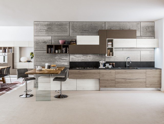 Oriente di Arrex Le Cucine ha le ante delle basi in laminato effetto legno con venatura in rilievo. I pensili geometrici danno vita ad un’originale composizione nei toni del marrone e del bianco. Il grande bancone snack è realizzato in pregiato Rovere bollito e ha un supporto in vetro temperato che lo rende leggero. Prezzo su richiesta. www.arrex.it Oriente di Arrex Le Cucine ha le ante delle basi in laminato effetto legno con venatura in rilievo. I pensili geometrici danno vita ad un’originale composizione nei toni del marrone e del bianco. Il grande bancone snack è realizzato in pregiato Rovere bollito e ha un supporto in vetro temperato che lo rende leggero. Prezzo su richiesta. www.arrex.it