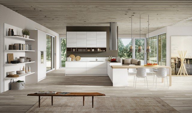 Un grande tavolo si innesta lateralmente nella penisola di Wega di Arredo3 la cucina che alterna elementi in laccato e in laminato bianco. Le ante senza maniglie sono dotate di una gola integrata nel pannello e ne esaltano il design geometrico. Prezzo su richiesta. www.arredo3.it Un grande tavolo si innesta lateralmente nella penisola di Wega di Arredo3 la cucina che alterna elementi in laccato e in laminato bianco. Le ante senza maniglie sono dotate di una gola integrata nel pannello e ne esaltano il design geometrico. Prezzo su richiesta. www.arredo3.it