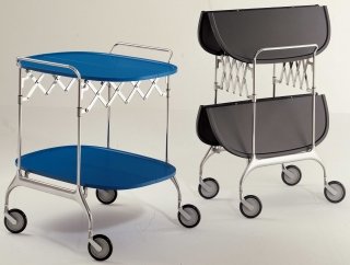 Gastone di Kartell è un carrello pieghevole che ha la struttura in acciaio cromato e i due ripiani in materiale plastico verniciato in cinque varianti di colore: la superficie antigraffio dei piani ne garantisce la durata. Misura L 68 x P 62 x H 70 cm. Prezzo 580 euro. www.kartell.com Gastone di Kartell è un carrello pieghevole che ha la struttura in acciaio cromato e i due ripiani in materiale plastico verniciato in cinque varianti di colore: la superficie antigraffio dei piani ne garantisce la durata. Misura L 68 x P 62 x H 70 cm. Prezzo 580 euro. www.kartell.com