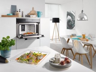 Il forno a vapore combinato microonde DGM 6800 di Miele può cuocere tre pietanze contemporaneamente e è regolabile su 7 livelli di potenza microonde. Con vano cottura capiente 40 litri ha programmi automatici per la preparazione dei più svariati alimenti. Misura L 59,5 x P 57,4 x H 45,5 cm. Prezzo 4.514 euro. www.mieleitalia.it Il forno a vapore combinato microonde DGM 6800 di Miele può cuocere tre pietanze contemporaneamente e è regolabile su 7 livelli di potenza microonde. Con vano cottura capiente 40 litri ha programmi automatici per la preparazione dei più svariati alimenti. Misura L 59,5 x P 57,4 x H 45,5 cm. Prezzo 4.514 euro. www.mieleitalia.it