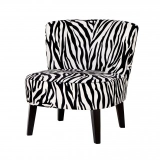 6. La poltroncina di Coincasa è interamente rivestita da uno scenografico tessuto zebrato; la struttura è in legno nero. Le dimensioni contenute permettono di inserirla anche in spazi ristretti. Misura L 64 x P 74 x H 73 cm. Prezzo 199 euro. www.coin.it 6. La poltroncina di Coincasa è interamente rivestita da uno scenografico tessuto zebrato; la struttura è in legno nero. Le dimensioni contenute permettono di inserirla anche in spazi ristretti. Misura L 64 x P 74 x H 73 cm. Prezzo 199 euro. www.coin.it