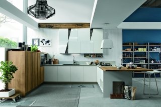 cucina con penisola e bancone snack in nobilitato termostrutturato nella colorazione Rovere Nodato Infinity Diagonal di Stosa cucina con penisola e bancone snack in nobilitato termostrutturato nella colorazione Rovere Nodato Infinity Diagonal di Stosa