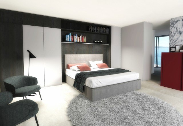 La camera da letto ricavata nell’ampio spazio del locale giorno è separata da una parete attrezzata bifacciale realizzata verso il living con il sistema Selecta (Officinadesign Lema) e verso la stanza con il programma Armadio al Centimetro inseriti nello spessore della parete stessa. L’armadio si caratterizza per le ante a battente laccate opaco nel raffinato color Cigno (una delle oltre quaranta possibilità cromatiche della cartella Lema). Protagonista dell’ambiente il letto Madama (Officinadesign Lema) con contenitore, rivestito in tessuto grigio dalla trama materica e con testiera imbottita, caratterizzata da una sobria lavorazione capitonné e da un profilo a coda di topo, tono su tono. Completano l’insieme due poltroncine Bice (design Roberto Lazzeroni) dalla linea avvolgente e dall’ispirazione vagamente rétro, rivestite in tessuto grigio scuro (ma disponibili anche in ecopelle o pelle), e la versione alta del contenitore notte Luna (design Marelli e Molteni), volume pulito impreziosito da originali incisioni laterali e raffinate giunzioni a 45°, scelto nella decisa tinta laccata opaca Amarena per dare un sofisticato tocco di colore all’insieme. La camera da letto ricavata nell’ampio spazio del locale giorno è separata da una parete attrezzata bifacciale realizzata verso il living con il sistema Selecta (Officinadesign Lema) e verso la stanza con il programma Armadio al Centimetro inseriti nello spessore della parete stessa. L’armadio si caratterizza per le ante a battente laccate opaco nel raffinato color Cigno (una delle oltre quaranta possibilità cromatiche della cartella Lema). Protagonista dell’ambiente il letto Madama (Officinadesign Lema) con contenitore, rivestito in tessuto grigio dalla trama materica e con testiera imbottita, caratterizzata da una sobria lavorazione capitonné e da un profilo a coda di topo, tono su tono. Completano l’insieme due poltroncine Bice (design Roberto Lazzeroni) dalla linea avvolgente e dall’ispirazione vagamente rétro, rivestite in tessuto grigio scuro (ma disponibili anche in ecopelle o pelle), e la versione alta del contenitore notte Luna (design Marelli e Molteni), volume pulito impreziosito da originali incisioni laterali e raffinate giunzioni a 45°, scelto nella decisa tinta laccata opaca Amarena per dare un sofisticato tocco di colore all’insieme.