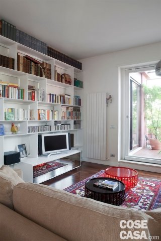 libreria a tutta parete Classico più contemporaneo