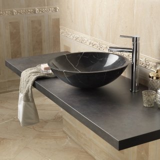 lavabo d’appoggio tondo di Leroy Merlin in pietra nera lavabo d’appoggio tondo di Leroy Merlin in pietra nera