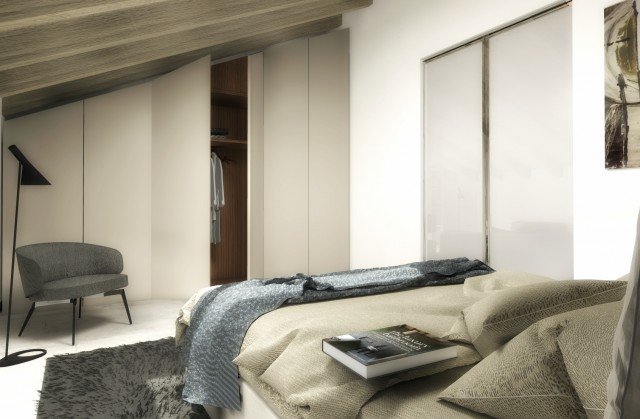 La zona notte mansardata è stata brillantemente risolta con l’Armadio su Misura Liscia di Officinadesign Lema, grazie all’elevato grado di personalizzazione che offre mixando standardizzazione e su misura. Versatile e adatto a progetti “sartoriali” come questo, poiché riducibile in altezza, larghezza, profondità, è laccato bianco Latte opaco, con ante battenti e interni in finitura larice Moka, e risolve il vincolo architettonico del soffitto inclinato in modo gradevole e pratico, dato che gli interni possono essere organizzati al meglio anche con le variazioni di altezza.
Il letto Semillon (Officinadesign Lema), dalle forme rigorose e lineari, si distingue per la testata alta e imbottita, completamente sfoderabile, in perfetta sintonia con la lineare essenzialità dell’armadio, e può essere eventualmente dotato anche di vano contenitore posizionato sotto alle rete (misure L 150/170/180/190 x P 216 x H 30/110,5 cm). Completa l’accogliente morbidezza della camera la poltroncina Bice (design Roberto Lazzeroni), dal tratto vagamente vintage, che si adatta a ogni ambiente della casa grazie alla misurata compostezza del disegno e alla varietà di rivestimenti in cui può essere declinata (tessuto, come in questo caso, pelle e ecopelle in diverse tonalità cromatiche). Avvolgente e confortevole, la seduta imbottita poggia su una elegante struttura portante in metallo bronzato. Misure L 71 x H 72 (schienale) / 42 (seduta) x P 70 cm. La zona notte mansardata è stata brillantemente risolta con l’Armadio su Misura Liscia di Officinadesign Lema, grazie all’elevato grado di personalizzazione che offre mixando standardizzazione e su misura. Versatile e adatto a progetti “sartoriali” come questo, poiché riducibile in altezza, larghezza, profondità, è laccato bianco Latte opaco, con ante battenti e interni in finitura larice Moka, e risolve il vincolo architettonico del soffitto inclinato in modo gradevole e pratico, dato che gli interni possono essere organizzati al meglio anche con le variazioni di altezza.
Il letto Semillon (Officinadesign Lema), dalle forme rigorose e lineari, si distingue per la testata alta e imbottita, completamente sfoderabile, in perfetta sintonia con la lineare essenzialità dell’armadio, e può essere eventualmente dotato anche di vano contenitore posizionato sotto alle rete (misure L 150/170/180/190 x P 216 x H 30/110,5 cm). Completa l’accogliente morbidezza della camera la poltroncina Bice (design Roberto Lazzeroni), dal tratto vagamente vintage, che si adatta a ogni ambiente della casa grazie alla misurata compostezza del disegno e alla varietà di rivestimenti in cui può essere declinata (tessuto, come in questo caso, pelle e ecopelle in diverse tonalità cromatiche). Avvolgente e confortevole, la seduta imbottita poggia su una elegante struttura portante in metallo bronzato. Misure L 71 x H 72 (schienale) / 42 (seduta) x P 70 cm.