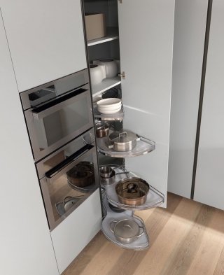 cucina con armadiatura angolare formata da colonne con ante laccato opaco Seta perla Linea di Comprex cucina con armadiatura angolare formata da colonne con ante laccato opaco Seta perla Linea di Comprex