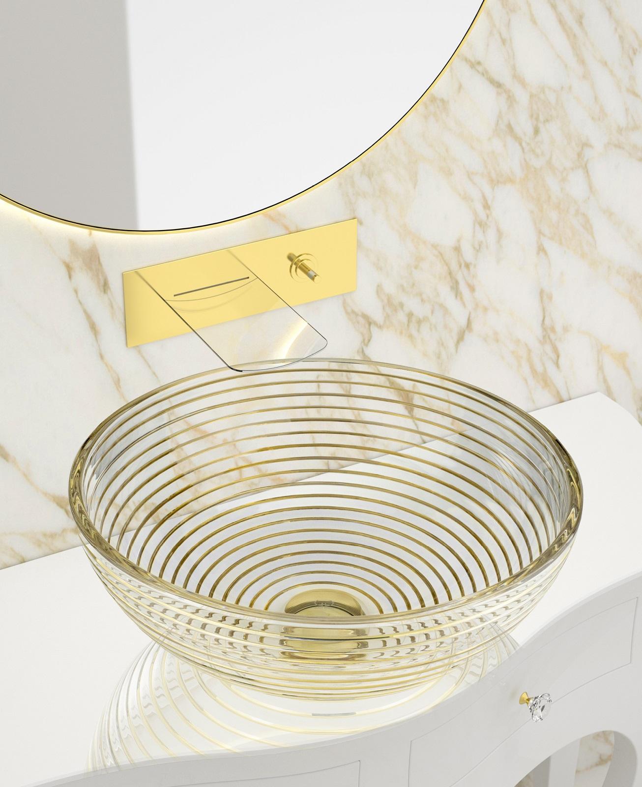 È realizzato in Cristallo de’ Medici® soffiato a bocca e molato a pietra il lavabo da appoggio Astro di Glass Design. Si presenta con un design a cerchi concentrici orizzontali e incisioni preziose riempite da una pennellata in oro zecchino. Misura Ø 34 x H 17 cm. Prezzo, Iva esclusa, 1.656 euro. www.glassdesign.it È realizzato in Cristallo de’ Medici® soffiato a bocca e molato a pietra il lavabo da appoggio Astro di Glass Design. Si presenta con un design a cerchi concentrici orizzontali e incisioni preziose riempite da una pennellata in oro zecchino. Misura Ø 34 x H 17 cm. Prezzo, Iva esclusa, 1.656 euro. www.glassdesign.it