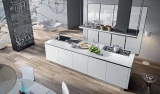cucina con isola attrezzata con fuochi, cappa sospesa e lavello in acciaio Bijou di Aran cucina con isola attrezzata con fuochi, cappa sospesa e lavello in acciaio Bijou di Aran