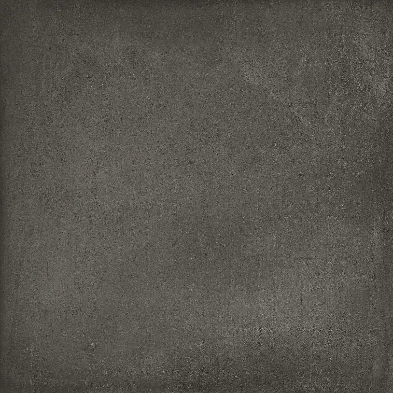 In gres porcellanato effetto cemento, il pavimento Rewind di Ragno è disponibile in sei colori e molti formati. In foto è proposto nel colore peltro, 60 x 60 cm.