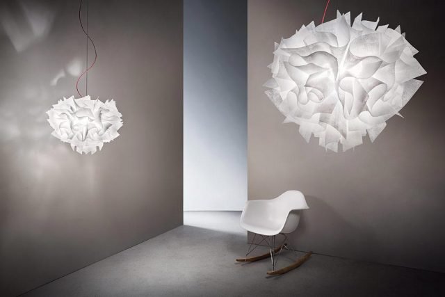 Veli Couture di Slamp è la lampada a sospensione, disegnata da Adriano Rachele, nella nuova finitura che si ispira ai morbidi tessuti contemporanei: è realizzata a mano in Opalflex® bianco che diffonde una luce calda e soffusa. Il paralume é disponibile in due dimensioni; il cavo rosso calzato ne sottolinea lo stile contemporaneo. Misura ø 60 x H 50 cm e ø 42 x H 36 cm. www.slamp.com Veli Couture di Slamp è la lampada a sospensione, disegnata da Adriano Rachele, nella nuova finitura che si ispira ai morbidi tessuti contemporanei: è realizzata a mano in Opalflex® bianco che diffonde una luce calda e soffusa. Il paralume é disponibile in due dimensioni; il cavo rosso calzato ne sottolinea lo stile contemporaneo. Misura ø 60 x H 50 cm e ø 42 x H 36 cm. www.slamp.com