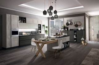 Cucina York di Stosa Cucine con apertura ante a gola e isola con tavolo integrato a centro stanza Cucina York di Stosa Cucine con apertura ante a gola e isola con tavolo integrato a centro stanza
