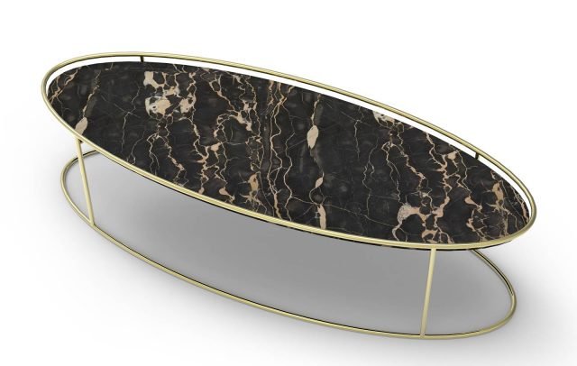Atollo di Calligaris è il nuovo tavolino con il piano ellittico realizzato in ceramica accoppiata vetro nella finitura Marmo nero. La struttura, esile e elegante, è in metallo ottone lucido. É disponibile anche rotondo in due altezze diverse. Misura L 110 x P 40 x H 30 cm. www.calligaris.it Atollo di Calligaris è il nuovo tavolino con il piano ellittico realizzato in ceramica accoppiata vetro nella finitura Marmo nero. La struttura, esile e elegante, è in metallo ottone lucido. É disponibile anche rotondo in due altezze diverse. Misura L 110 x P 40 x H 30 cm. www.calligaris.it