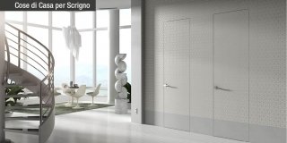 Porte filomuro Essential by Scrigno: armonia di forme, spazi e colori