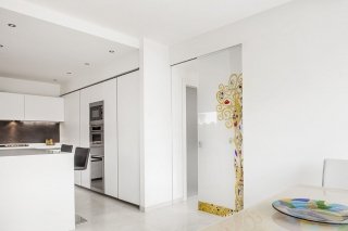 Porta a scomparsa in vetro modello Opera di Eclisse Porta a scomparsa in vetro modello Opera di Eclisse