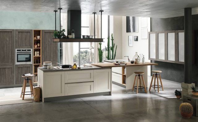 City Restyle di Stosa ha ante in Pet, materiale riciclabile e durevole, e piano top in Fenix Ntm® color grigio Londra e piano d’appoggio in legno invecchiato rovere Alaska. Una base con anta da 60 cm costa a partire da 157 euro. Fenix Ntm® è una resina termoplastica di ultima generazione (applicata su pannelli in fibra di legno idrorepellente), in grado di autoripararsi da micro graffi con la semplice esposizione al calore. Si contraddistingue per la superficie antimpronta, opaca e soft touch. Offre elevata resistenza ai solventi acidi di uso domestico e contrasta il proliferare dei batteri. Si pulisce facilmente con acqua e detersivo. City Restyle di Stosa ha ante in Pet, materiale riciclabile e durevole, e piano top in Fenix Ntm® color grigio Londra e piano d’appoggio in legno invecchiato rovere Alaska. Una base con anta da 60 cm costa a partire da 157 euro. Fenix Ntm® è una resina termoplastica di ultima generazione (applicata su pannelli in fibra di legno idrorepellente), in grado di autoripararsi da micro graffi con la semplice esposizione al calore. Si contraddistingue per la superficie antimpronta, opaca e soft touch. Offre elevata resistenza ai solventi acidi di uso domestico e contrasta il proliferare dei batteri. Si pulisce facilmente con acqua e detersivo.