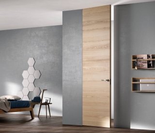 Nella foto, modello Exit Zero della linea Sistema Zero di FerreroLegno nella finitura in Rovere Natural Touch. Dimensioni: cm 80x290 Telaio: A_Filo completamente integrato nel muro. Nella foto, modello Exit Zero della linea Sistema Zero di FerreroLegno nella finitura in Rovere Natural Touch. Dimensioni: cm 80x290 Telaio: A_Filo completamente integrato nel muro.
