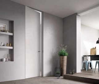 Nella foto, modello Exitlyne Zero della linea Sistema Zero di FerreroLegno nella finitura laccato lucido bianco. Dimensioni: cm 80x290 Telaio: A_Filo completamente integrato nel muro. Nella foto, modello Exitlyne Zero della linea Sistema Zero di FerreroLegno nella finitura laccato lucido bianco. Dimensioni: cm 80x290 Telaio: A_Filo completamente integrato nel muro.