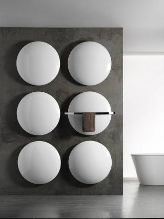 radiatore scultoreo e zen style della Antrax SATURN & MOON design Peter Rankin radiatore scultoreo e zen style della Antrax SATURN & MOON design Peter Rankin