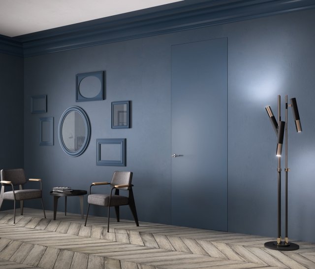 Porta filomuro Exit Zero della linea Sistema Zero di FerreroLegno, proposta con anta grezza e finita con la stessa finitura della parete. Dimensioni: 80×270 cm. Telaio: A_Filo completamente integrato nel muro. Porta filomuro Exit Zero della linea Sistema Zero di FerreroLegno, proposta con anta grezza e finita con la stessa finitura della parete. Dimensioni: 80×270 cm. Telaio: A_Filo completamente integrato nel muro.